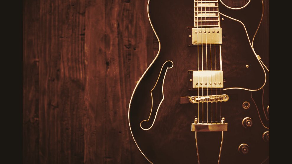 Charred red Longhorn 4-string body detail